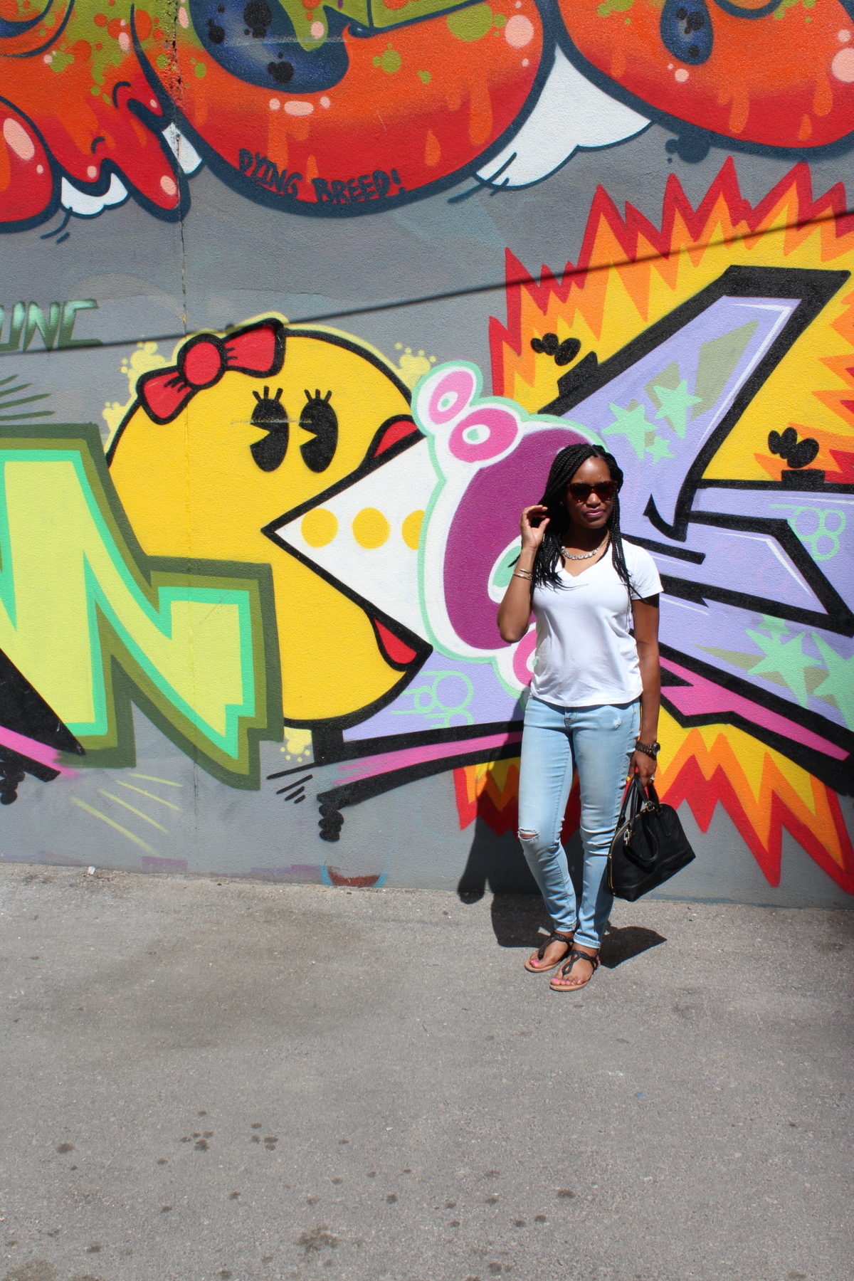 Toronto has lots of colorful graffiti that catches the eye when walking down the street.