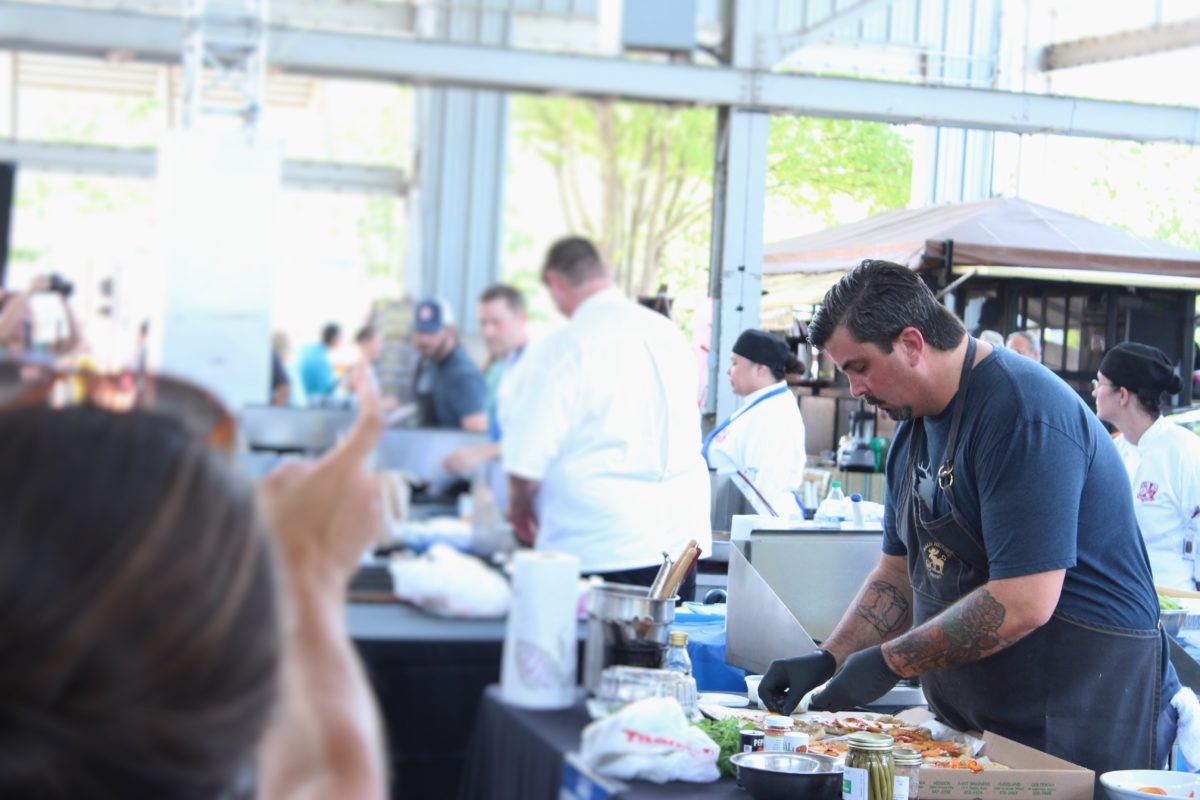 Chef Eric Fulkerson competing in the Five Star Food Fight at the Chattanooga Market.