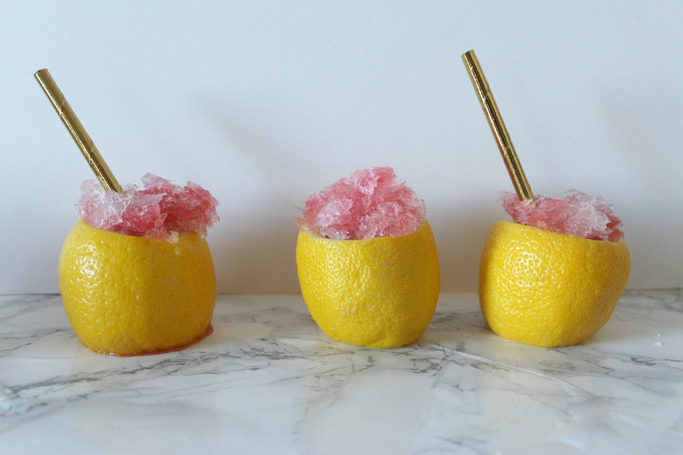 Lemonade is already a refreshing beverage. When you add vodka and cute lemon cups, it's even better.