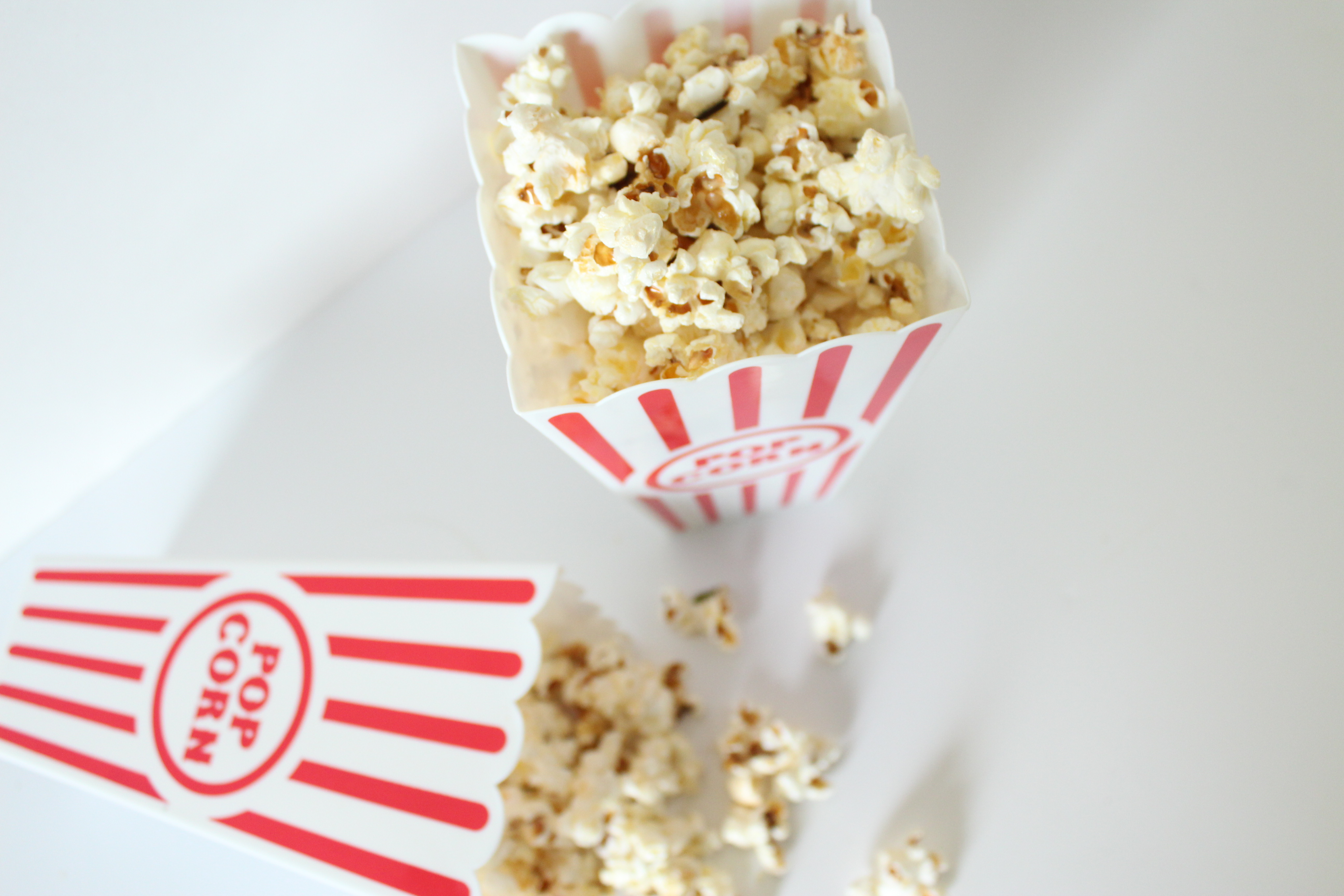 Movie theater popcorn gets its buttery flavor from oils. The at home version is a much better option and very easy.