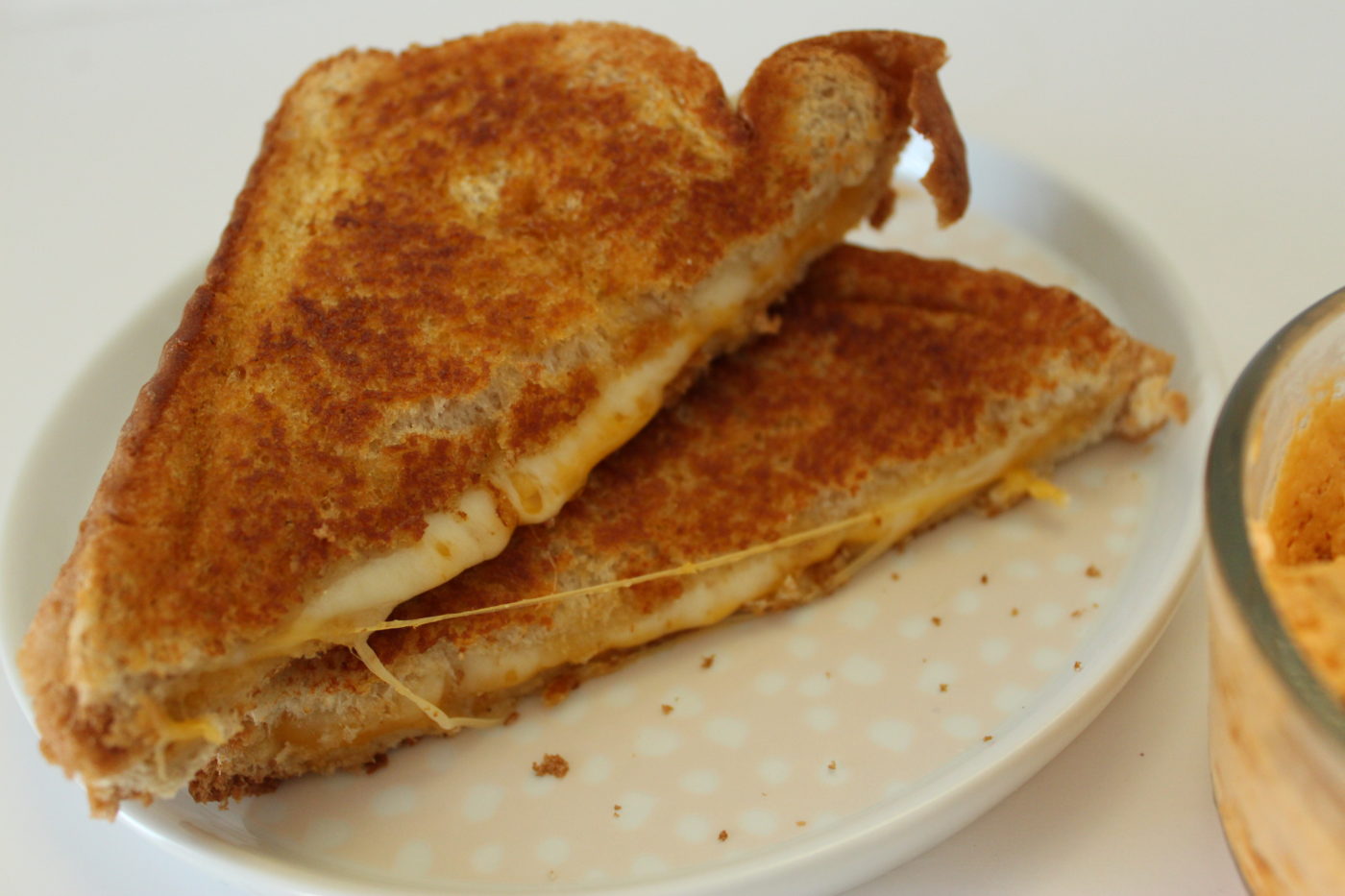 Adding sriracha butter to a comforting grilled cheese sandwich gives it the richest flavor.