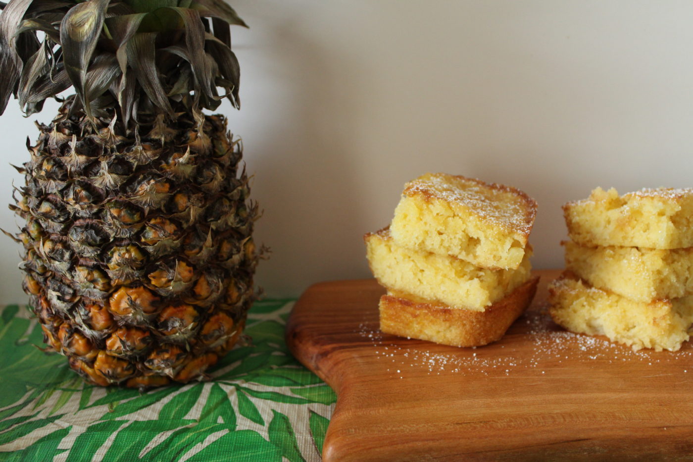 Pineapple bars can be enjoyed on their own or with a scoop of ice cream or with a few fresh berries.