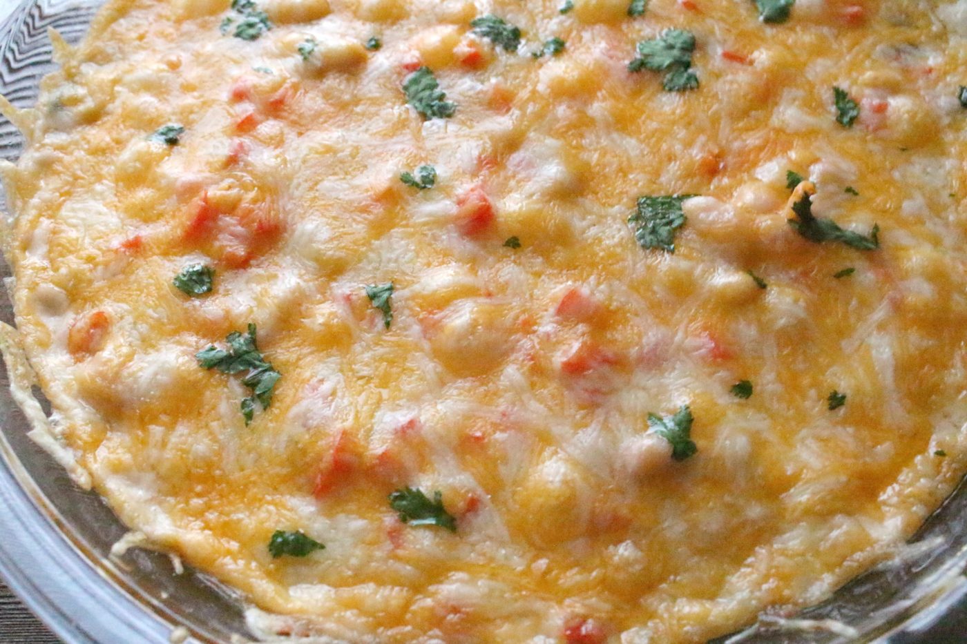 This chicken chili dip is cheesy, flavorful and perfect for a party.