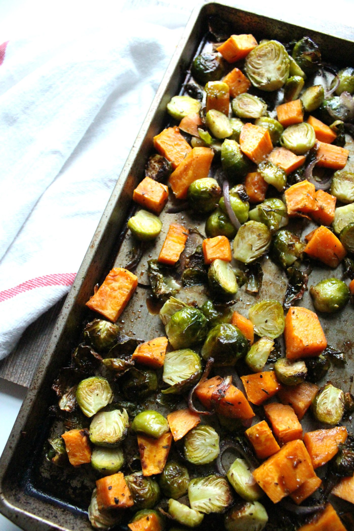 Maple roasted Brussels sprouts and sweet potatoes are the best side dish all year-round.