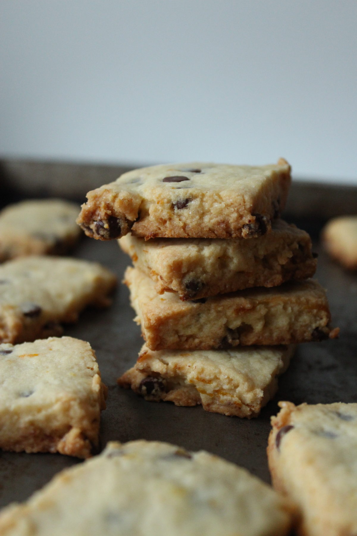 stacked shortbread cookies on baking sheet.