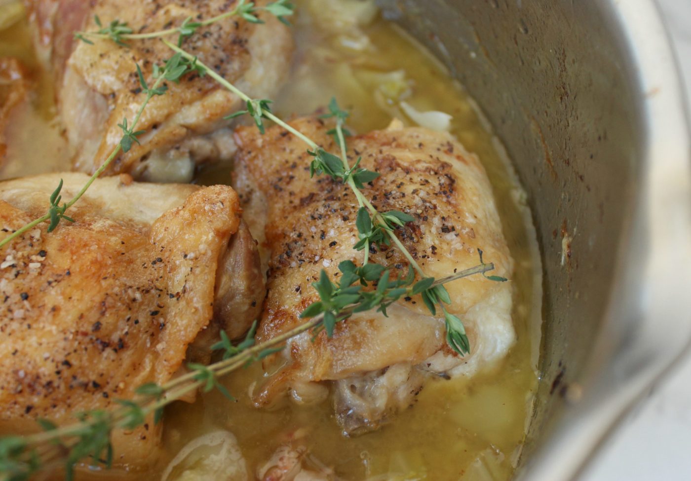 Braised chicken thighs and cabbage.