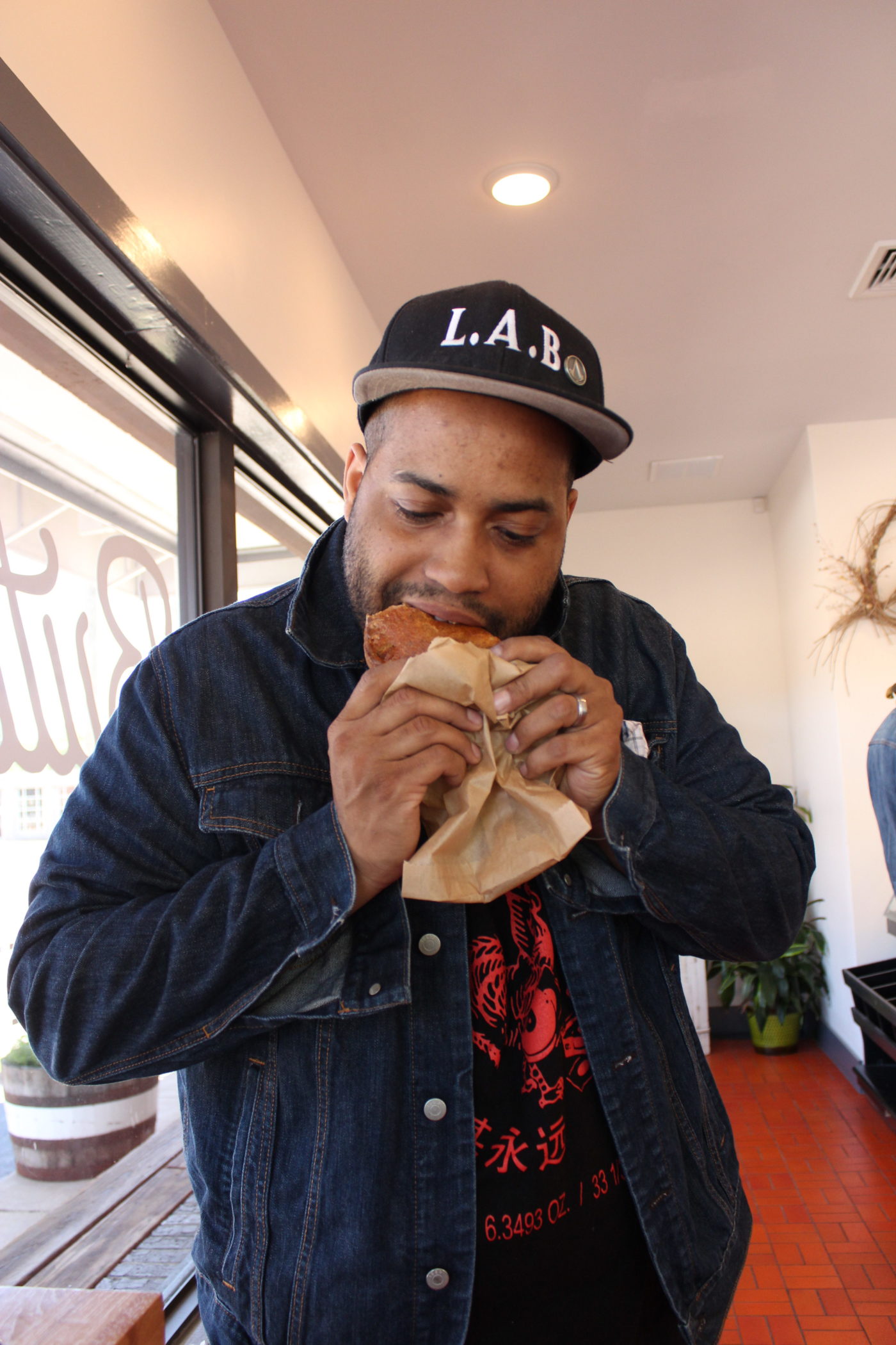 Chowing down on a cowboy pocket at Bread and Butter bakery.