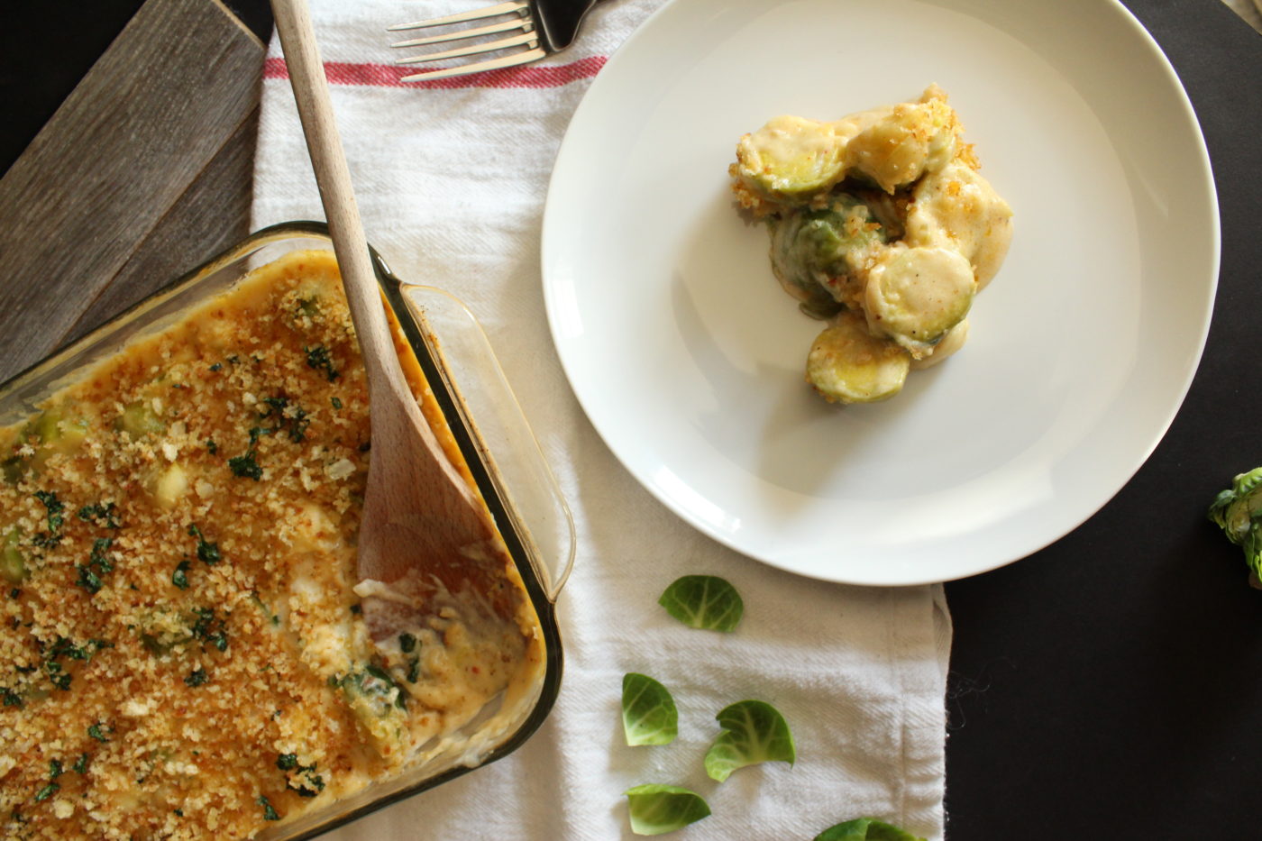 white plate with baked brussels sprouts