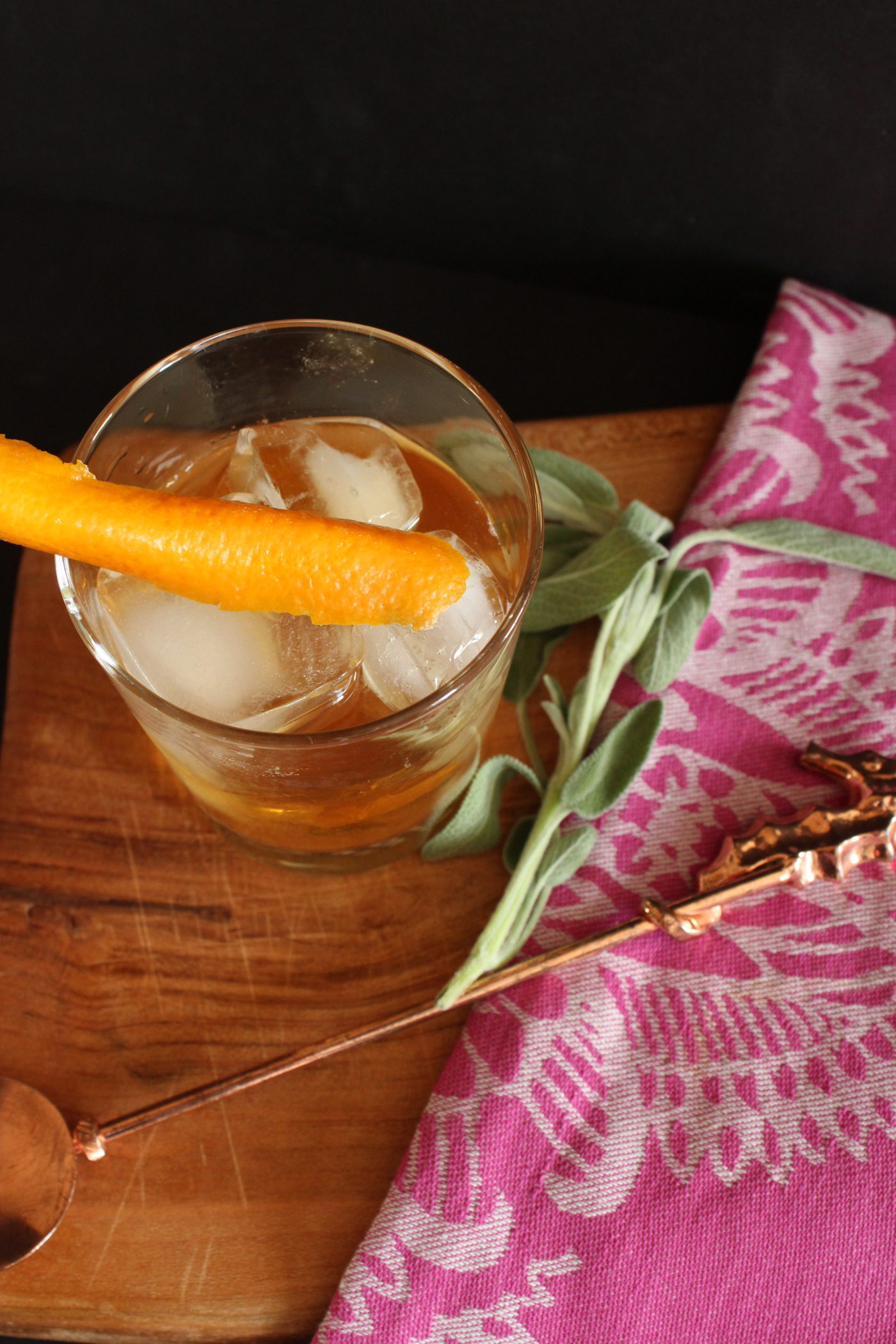 bourbon in glass with orange peel