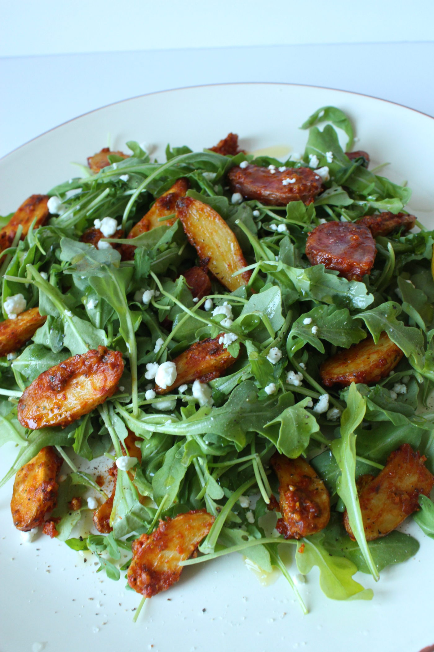 Arugula Pomegranate Goat Cheese Salad with Toasted Pecans and