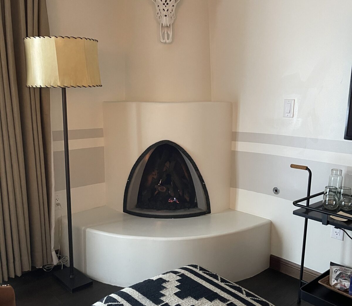 Fireplace in a room at Bishop's Lodge Hotel in Santa Fe, New Mexico.