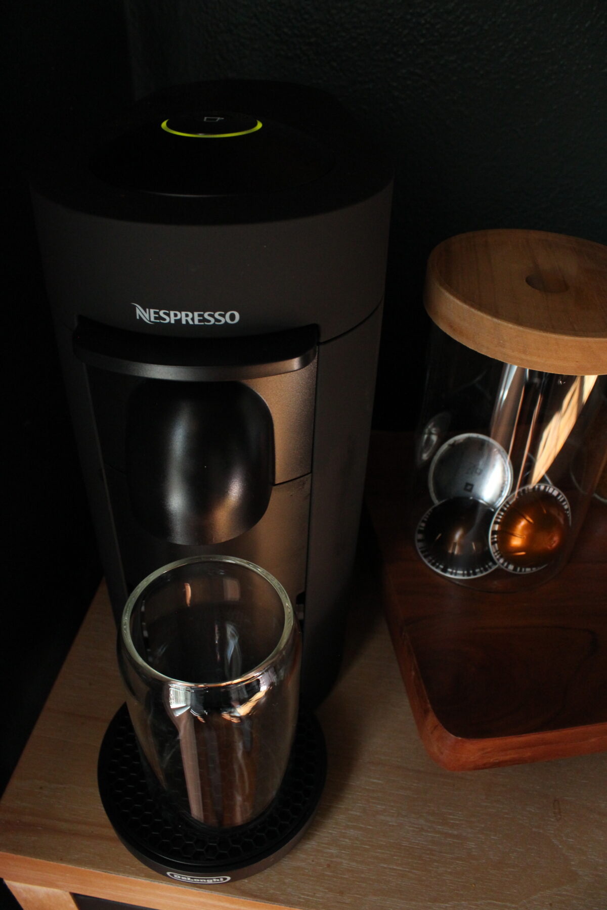 Photo of black Nespresso machine.